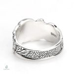 Bague serpent argentée avec motif crâne, style unique