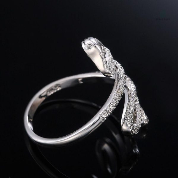 Bague originale serpent en or blanc brillant
