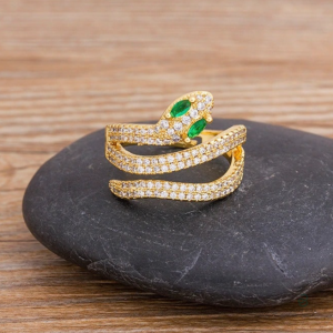 Bague serpent or ornée de diamants et yeux émeraude