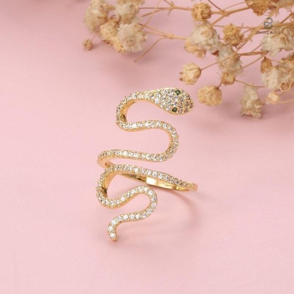 Bague serpent ornée de zirconium sur métal doré