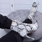 Bottines tendance serpent blanc, un incontournable de la saison