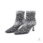 Bottines Serpent blanches et noires au design élégant