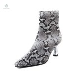 Bottines serpent blanches avec motifs contrastants