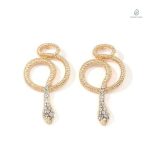 Boucles d'oreilles serpent or rose avec diamant
