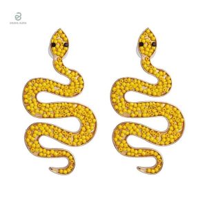 Boucles d'oreilles serpent avec perle jaune élégante
