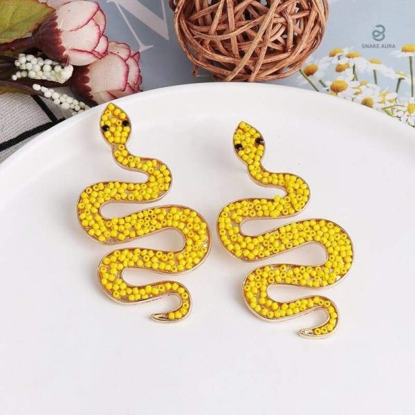 Boucles serpent chambres dorées avec perles jaunes assorties