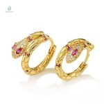 Boucles d'oreilles serpent en or avec diamant rose