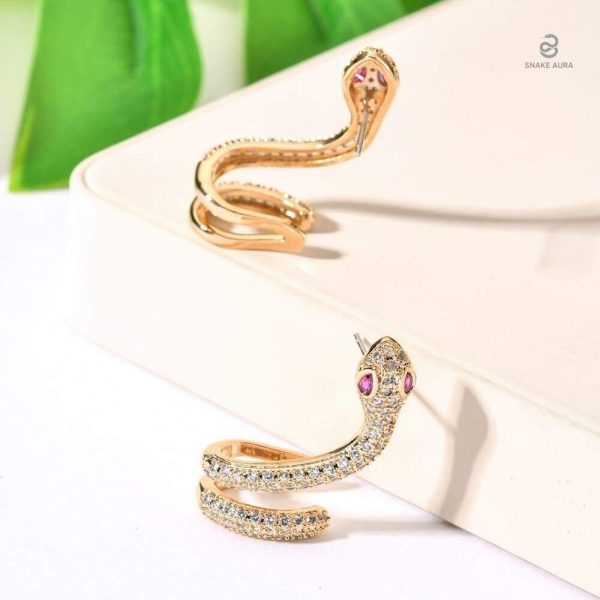 Boucles d'oreilles or design serpent, accessoire chic