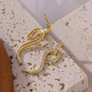 Bijoux serpent or avec touches de diamant