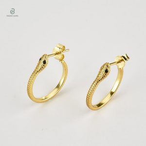 Boucles serpent or élégantes pour femme
