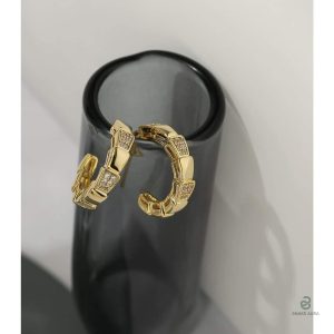 Bijoux serpent dorés, style écailles, élégance moderne