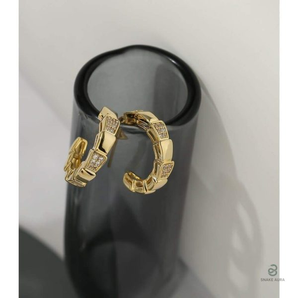 Bijoux serpent dorés, style écailles, élégance moderne