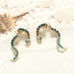 Bijoux femme : boucles d'oreilles serpent pour un look chic