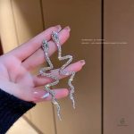 Boucles d'oreilles serpent cristal blanc grande taille