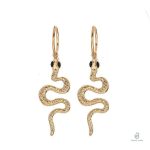 Boucles d'oreilles serpent en or avec yeux noirs