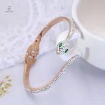 Jonc serpent en acier précieux, décoré de diamants