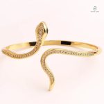 Bracelet manchette serpent en or jaune avec oxyde de zirconium