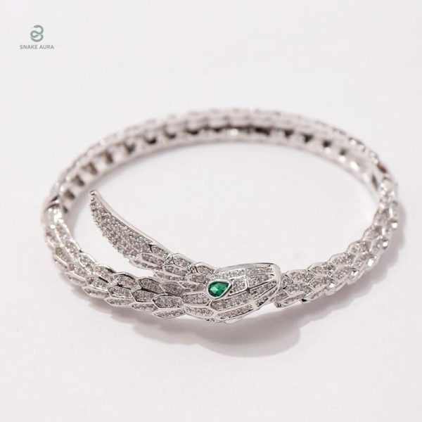 Bracelet serpent argenté avec détails en vert
