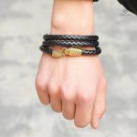 Bijou serpent cuir noir avec finition dorée