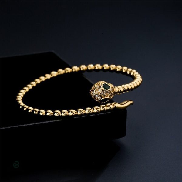 Bracelet doré serpent, finition en cuivre pour un look sophistiqué