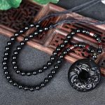 Bijoux serpent en obsidienne noire, style unique