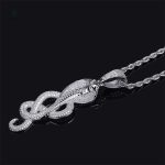 Accessoire masculin en argent, motif serpent avec strass