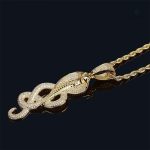 Bijou serpent or avec strass pour homme