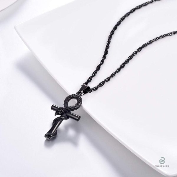 Accessoire serpent chic avec motif croix en noir
