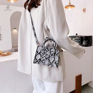Sac à main serpent blanc, parfait pour toutes occasions