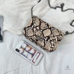 Sac serpent beige, accessoire chic pour toutes occasions