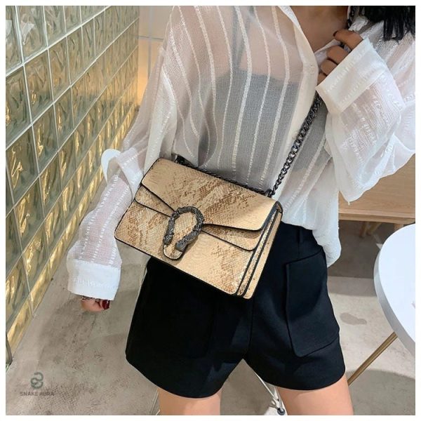 Accessoire mode python doré, idéal pour toutes occasions