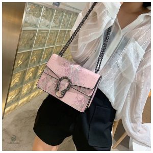 Sac à main en python, teinte rose, pour un look moderne