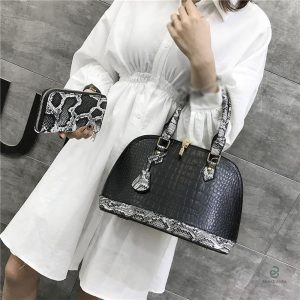 Accessoire mode cuir noir serpent tendance