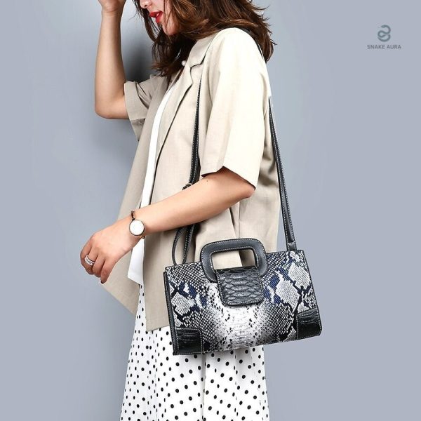 Sac Noir avec motif serpent, design élégant et contemporain